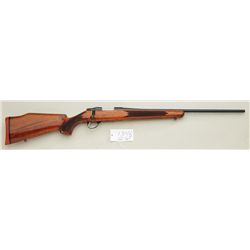 Sako bolt-action rifle, .222 Rem. cal., 22”  round barrel, black finish, checkered wood  stock, slin