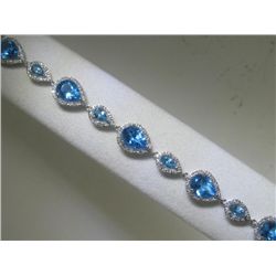 Blue Topaz and .57 ct Diamonds 14K White Gold Bracelet