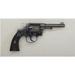 Colt Police Positive DA revolver, .38 Special  cal., 4” barrel, blue finish, checkered  black finely