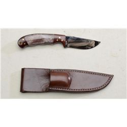 High quality hand-made sheath knife marked  “D. Boltinghouse”, serial numbered “A198”.  Fancy grip a