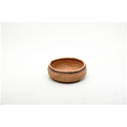 Small woven Mission Indian bowl approx. 7” in  diameter with simple brown ring design under  the rim