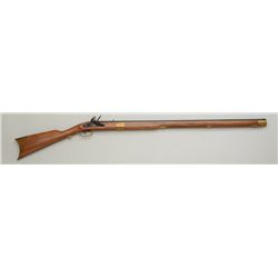 Spanish modern copy of a full stocked  flintlock rifle, .45 cal., 33” octagon  barrel, black finish,