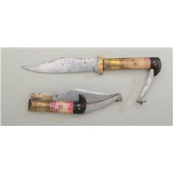 Pair of 19th century mid-eastern folding  knives with bone and horn grips, near  matching in style a