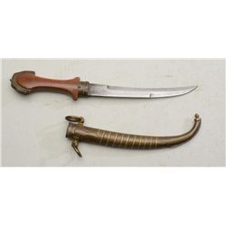 Indo-Chinese curved blade belt knife with  wood grip and hammered brass sheath with  hanging rings, 