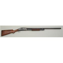 Winchester Model ’97 pump action shotgun,  take down variation, 12 gauge, 30” barrel,  blue finish,