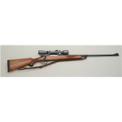 Custom CZ Brno bolt action rifle, 7mm cal.,  24” barrel, blue finish, checkered deluxe  wood stock,