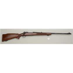 Winchester Model 70 bolt-action rifle, .30-06  cal., 24” barrel, blue finish, checkered  wood stock,