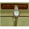 Image 1 : Beautiful ladies Jules Jurgenson watch with  diamond and ruby bezel and dial. Estimate  $800-$1,200