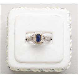 Ladies 14k white gold ring set with an  emerald cut sapphire approx 1.35ct and 40  round diamonds we