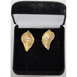 Pair of 18k gold (11.6gms) leaf design French  clip earrings with set with  6 diamonds  weighing app