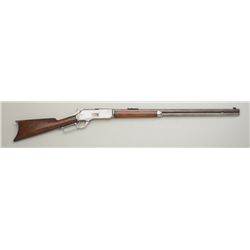 Winchester Model 1876 lever action rifle,  .45-60 cal., 28” round barrel, plain wood  stocks, #31873