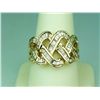 Image 1 : Gorgeous 14 karat yellow gold ladies weave  design ring channel set with over 110  baguette cut diam