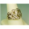 Image 2 : Gorgeous 14 karat yellow gold ladies weave  design ring channel set with over 110  baguette cut diam