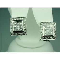 Superb 18 karat white gold ladies custom made  earrings invisible and pave set with very  fine princ