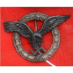 Scarce 1935-1936 German Pilot’s badge with  spread eagle over swastika and circular  wreath; combat 