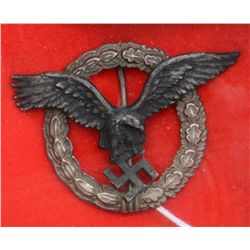 Scarce 1935-1936 German Pilot’s badge with  spread eagle over swastika and circular  wreath; combat 