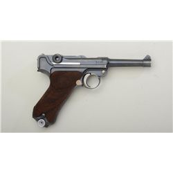 German Luger by DWM dated 1915 semi-auto  pistol, 9mm cal., 4” barrel, military blue  finish, checke