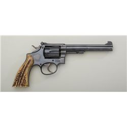 Smith and Wesson (K-38 Model) DA revolver,  five screw frame, .38 Special cal., 6”  barrel, blue fin