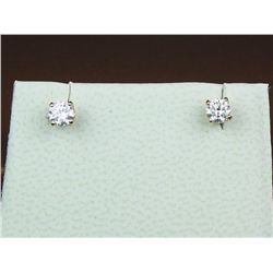 Brilliant 14 karat yellow gold ladies diamond  stud earrings weighing approx. 0.45 carats  of G-H co