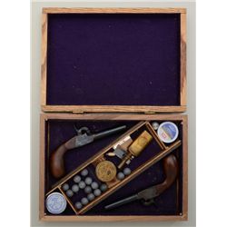 Pair of blackpowder Italian-made copies of  folding trigger single shot screw barrel  percussions de