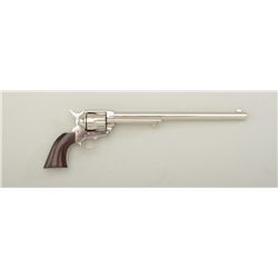 Miniature operational copy of a Colt Buntline  SAA revolver, nickel finish, wood grips,  #1179. This