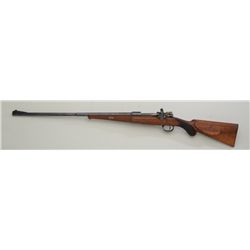 Sporterized German Mauser bolt-action rifle,  7.65mm cal., 24” barrel, blue finish,  checkered custo