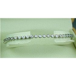 Stylish 14 karat white gold ladies diamond  bracelet fine set with 50 round diamonds  weighing appro