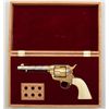 Image 1 : Colt SAA revolver, western style non-factory  engraving, .45 cal., 5-1/2” barrel, nickel  and gold w