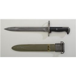 U.S. military bayonet and sheath, approx. 16”  overall with an approx. 10” blade marked  “U.C.”, fla