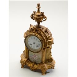 Beautiful gold gilded metal antique mantle  clock approx. 14” in height, 8” wide and 5”  deep with b