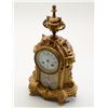 Image 1 : Beautiful gold gilded metal antique mantle  clock approx. 14” in height, 8” wide and 5”  deep with b