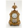 Image 2 : Beautiful gold gilded metal antique mantle  clock approx. 14” in height, 8” wide and 5”  deep with b