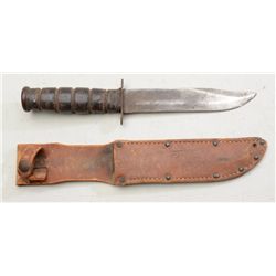 WW II era U.S. military fighting knife and  leather sheath in untouched, well-worn  condition; sheat