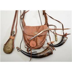 Mountain Man’s lot modern-made equipment  including a large leather possible bag,  reproduction bras