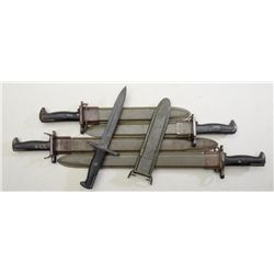 Lot of 5 WW II and Korea era U.S. bayonets  with olive green fiberglass like scabbards,  various mak