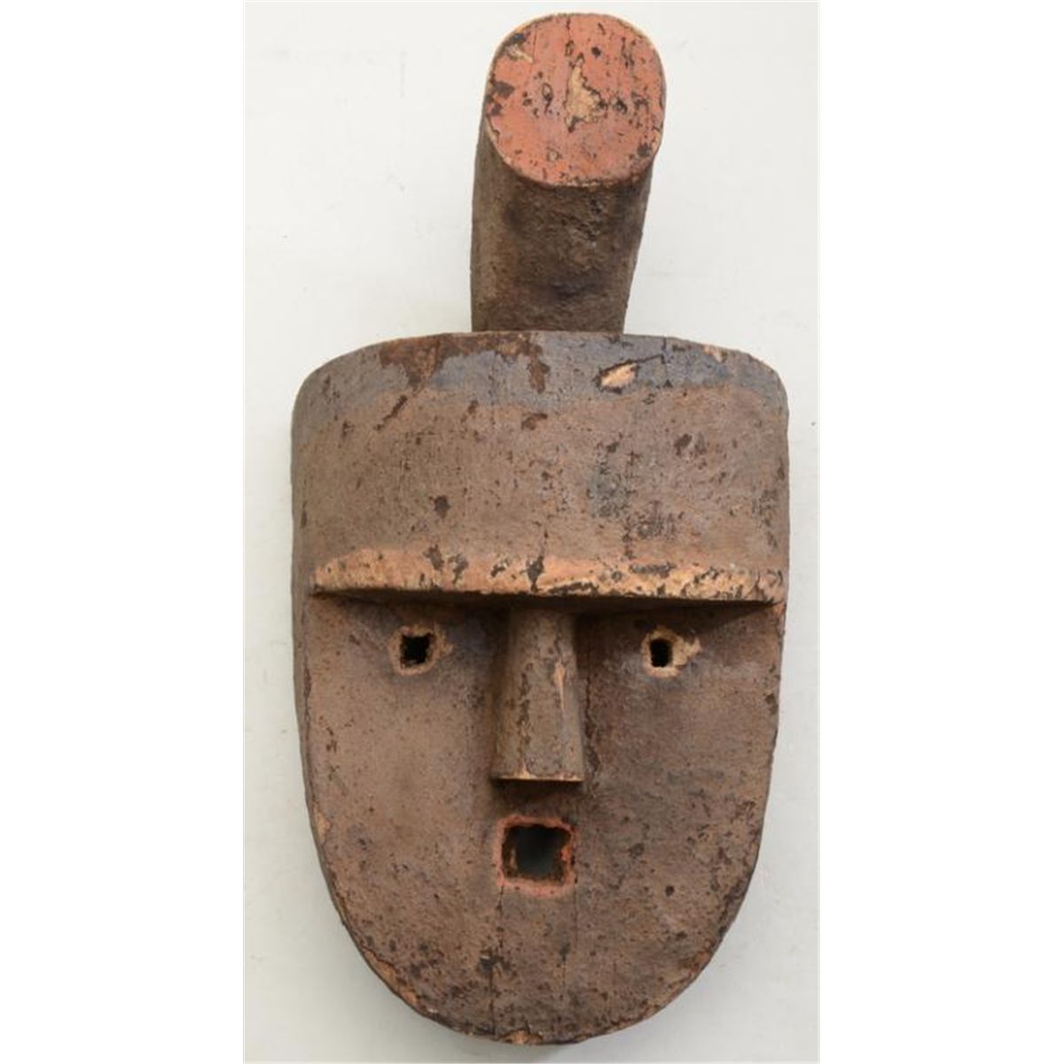 Carved wooden ceremonial mask approx. 14” x 8” overall showing age and ...