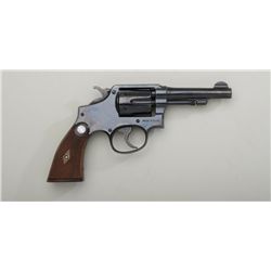 Smith & Wesson 5 screw hand ejector DA  revolver, .38 cal., 4” barrel, blue finish,  checkered wood 