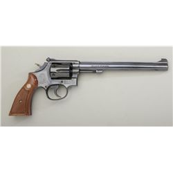 Smith & Wesson Model 17-4 DA revolver, .22LR,  8-3/8” barrel, blue finish, checkered  medallion wood