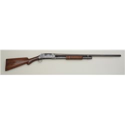 Winchester Model 1897 takedown pump action  shotgun, 16 gauge, 28” barrel, blue finish,  wood stocks