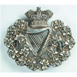 circa 1890: Royal Irish Regiment officer's pith helmet badge