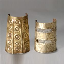 two ancient andean wrist guards or cuffs