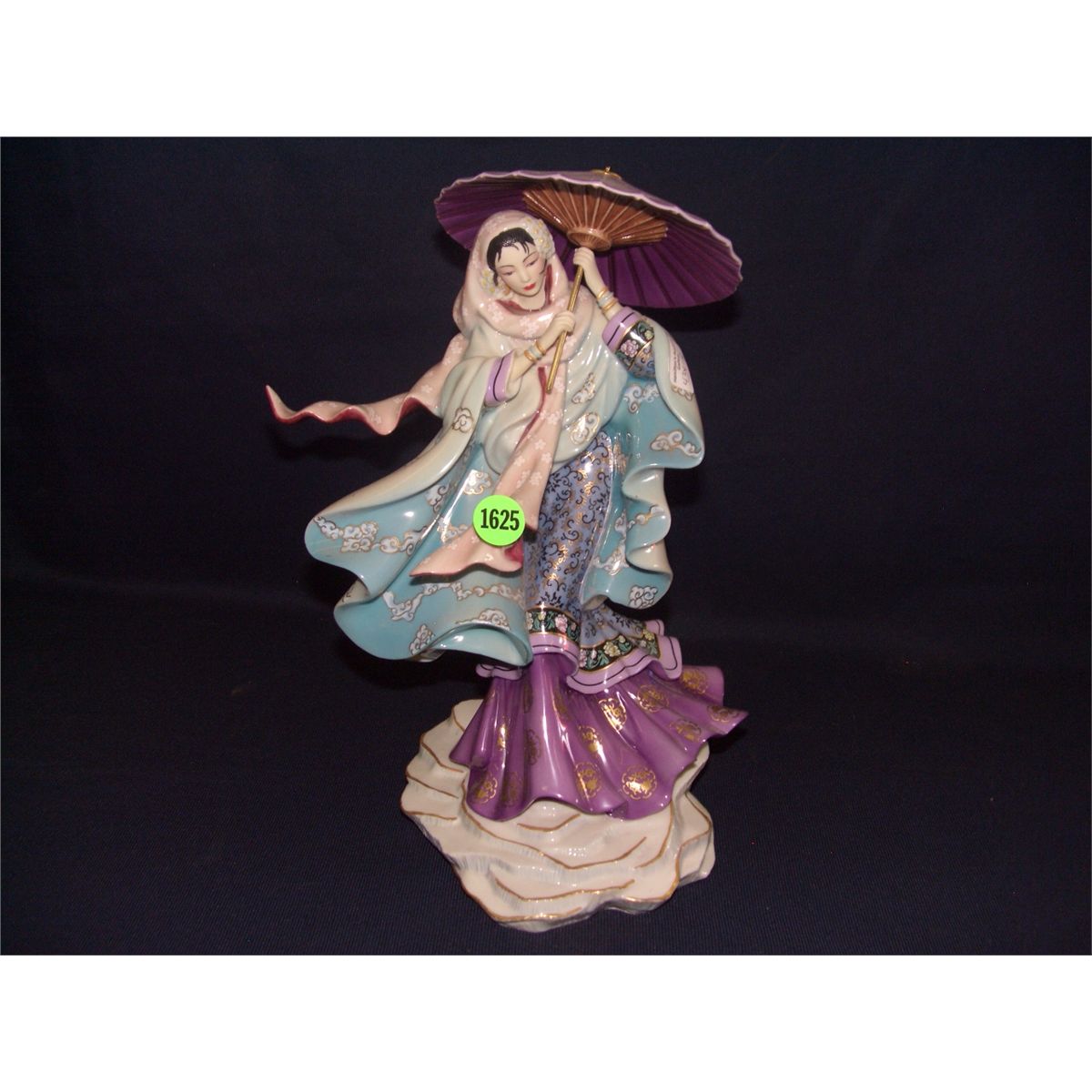 porcelain asian lady figurine by Caroline Young