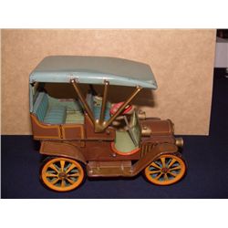 vintage childs tin litho toy car by T.M. Japan, as seen