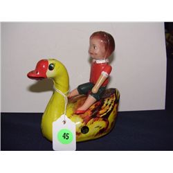 Alps tin wind up toy swan and rider holding fishing pole & fish (no Key)