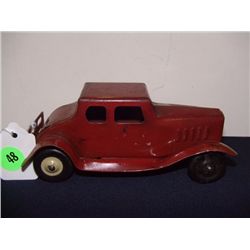 tin toy Wyandotte red car