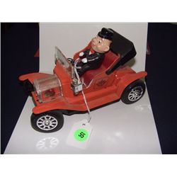 metal model-T car and driver battery operated Japan "Shaking" classic toy car