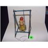 Image 1 : very old child's swinging monkey toy on metal swing frame