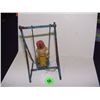 Image 3 : very old child's swinging monkey toy on metal swing frame