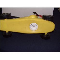 Royalty Industries dog in race car bank