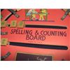Image 2 : cardboard game, spelling and counting wheel